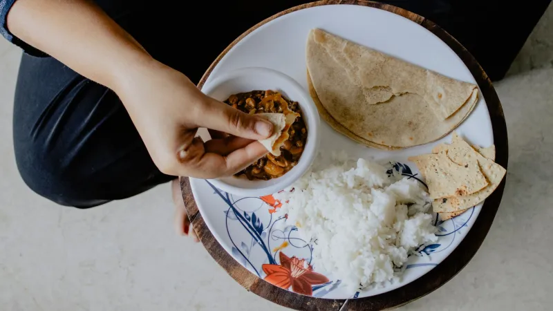 Why Your Couch Might Be the Best Seat in the House for Indian Food